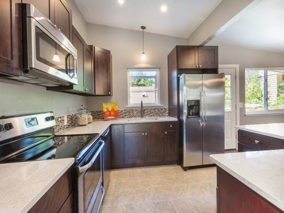 An image of a kitchen with some basic must-have kitchen appliances.