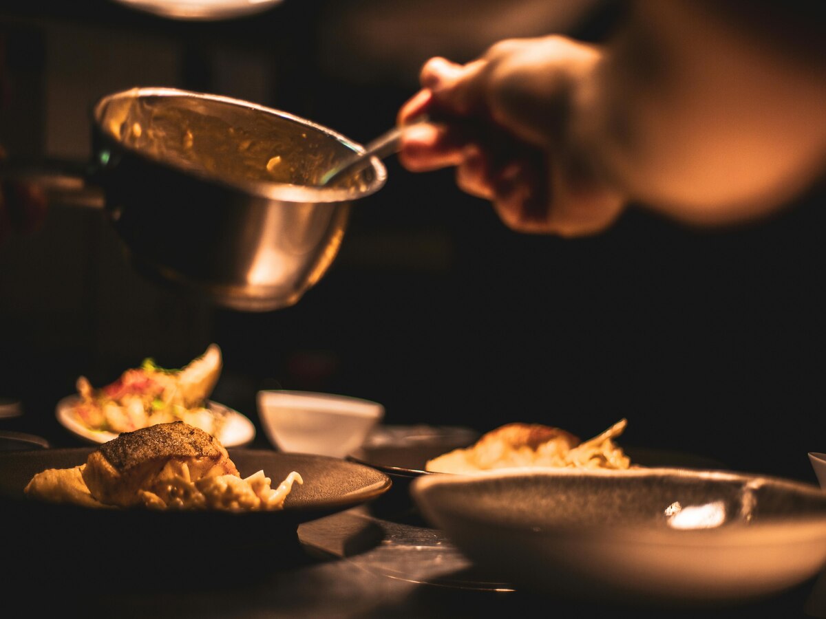 An image of kitchen essentials - a saucepan, bowl, and tableware.